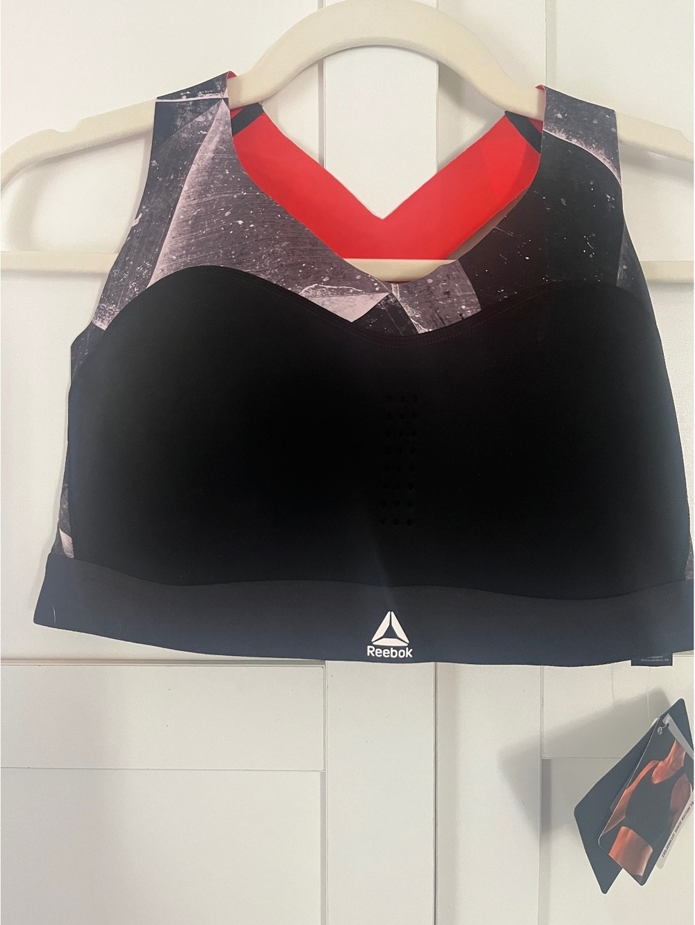 Reebok Women's Black and Gray Sports Bra with Red Back Detail, Size Medium